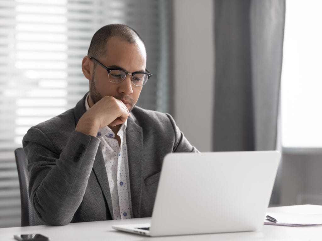 Serious business owner updating a WordPress website. 